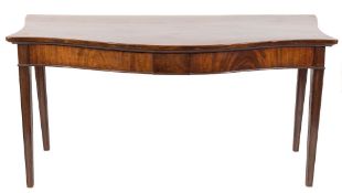 An early 19th Century mahogany serpentine fronted serving table:, with serpentine sides,