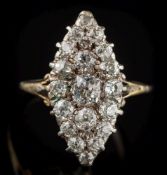 A diamond mounted, marquise-shaped cluster ring: with graduated,