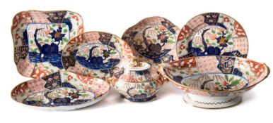 A Coalport porcelain 'Japan' pattern part dessert service: painted and gilded with rockwork, trees,