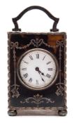An Edwardian miniature tortoiseshell and silver carriage clock: the eight-day duration timepiece