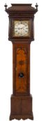 An early oak longcase clock: the eight-day duration movement striking the hours on a bell,