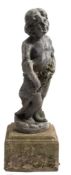 A lead figure of a girl: clutching a floral garland, mounted on a concrete plinth,