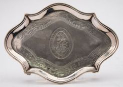 A George III silver teapot stand, maker's mark worn London, 1788: crested and initialled,