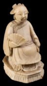 A mixed lot of Canton carved ivory: comprising a 'mandarin pattern' chess piece on puzzle ball