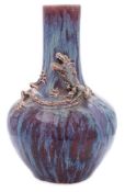 A Chinese flambé-glazed bottle vase: of globular form with raised neck,