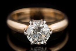 A diamond solitaire ring: the circular, brilliant-cut diamond approximately 7.4mm diameter x 4.