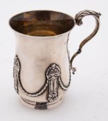 A George V silver christening mug, maker's mark worn, London, 1918: of cylindrical outline,