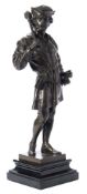 A bronze study of a medieval guard: dark brown patination,