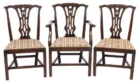 A set of seven late 19th Century carved beech dining chairs in the Chippendale taste:,