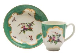 A First Period Worcester coffee cup and saucer: painted with 'spotted fruit' and insects within