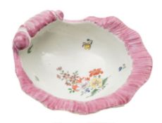 A First Period Worcester shell sweetmeat dish: with shaped and curled pink rim and painted with a