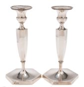 A pair of Edward VII silver candlesticks, maker Hawksworth Eyre & Co Ltd,