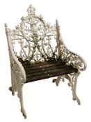 A Victorian cast iron garden armchair:, of Coalbrookdale type,