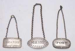 A George IV silver decanter label, maker JW, Birmingham, 1824: of rectangular outline 'Brandy',