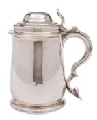 A George II silver tankard, maker Thomas Farren, London, 1733: crested, of cylindrical form,