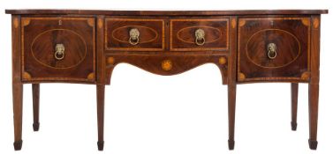 A late 19th Century mahogany, satinwood crossbanded and inlaid serpentine-fronted sideboard:,
