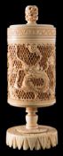 A late 19th/early 20th century Chinese carved ivory pierced jar and cover: of cylindrical outline,