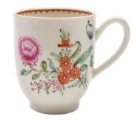 A First Period Worcester coffee cup: painted with three floral sprays in the famille rose palette,