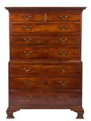 A George III mahogany chest on chest:, with a moulded dentil cornice,