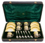 A Staffordshire porcelain and silver mounted coffee set, maker William Comyns & Sons Ltd,