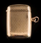 A 9ct gold engine turned vesta case:,14.5gms gross weight.