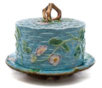 A George Jones majolica small stilton dome and stand: of basket moulded form with rustic twig knop
