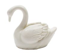 A Lowestoft model of a swan: in the white, naturalistically modelled with neck arched,
