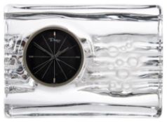 A Daum mantel clock: the round black dial having dauphine hands and a sweep seconds hand,