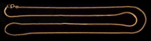 A fox-tail link necklace: the clasp stamped '750', 12gms gross weight.