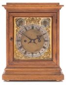 Winterhalder and Hoffmeier, Germany, an oak mantel clock: the eight-day duration,