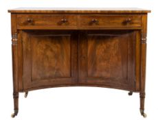A George IV mahogany dressing table :, the top with a crossbanded and line inlaid border,