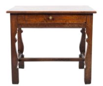An 18th Century oak rectangular side table:, fitted with a single frieze drawer,