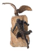 A 19th century gilt metal and bronze study 'The Torture of Prometheus': the semi naked figure