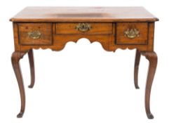 An 18th Century oak rectangular lowboy:, the top with a moulded edge and re-entrant corners,