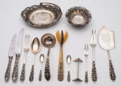 A South East Asian suite of silver cutlery:, stamped '800', including fish knives and forks,