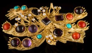 A coloured gem-stone mounted brooch: of stylized spray design with amethysts, coral, turquoise,