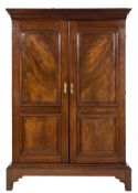 A mid 18th Century mahogany side cupboard on a low stand:,