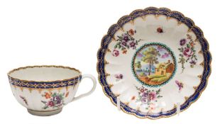 A First Period Worcester fluted cup and saucer: of 'Lord Henry Thynne' type,