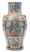 A Cantonese porcelain vase of baluster form: with gilt mask handles,