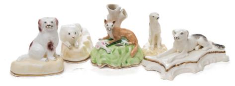 Five Samuel Alcock porcelaineous animal groups: comprising four dogs including a King Charles