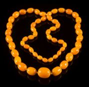 A graduated amber bead,