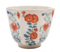 A Chelsea octagonal beaker: finely painted in the Kakiemon style with panels of flowering plants in