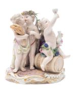 A Meissen porcelain group allegorical of the Seasons: modelled as scantily clad putti,