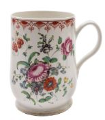 A Bow bell-shaped mug: the grooved loop handle with heart-shaped terminal,