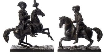 A 19th century patinated bronze study of a cavalier: mounted on a rearing horse,