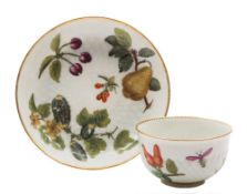 A Chelsea tea bowl and saucer: with pineapple moulding,
