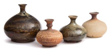 * Waistel Cooper (1921-2003) four stoneware lamp bases: of squat form with raised necks,