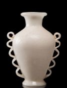 Attributed to Napoleone Martinuzzi (1892-1977) a pulegoso glass vase: the white body of footed
