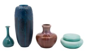 Four pieces of Pilkington Royal Lancastrian pottery: comprising a ribbed oviform jar with embossed
