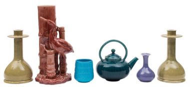 Six pieces of art pottery: comprising a Bretby 'stork' vase, a Linthorpe tea pot, Wardle vase,